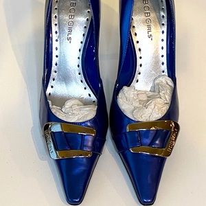 Blue - iridescent; not super shiny patent leather.